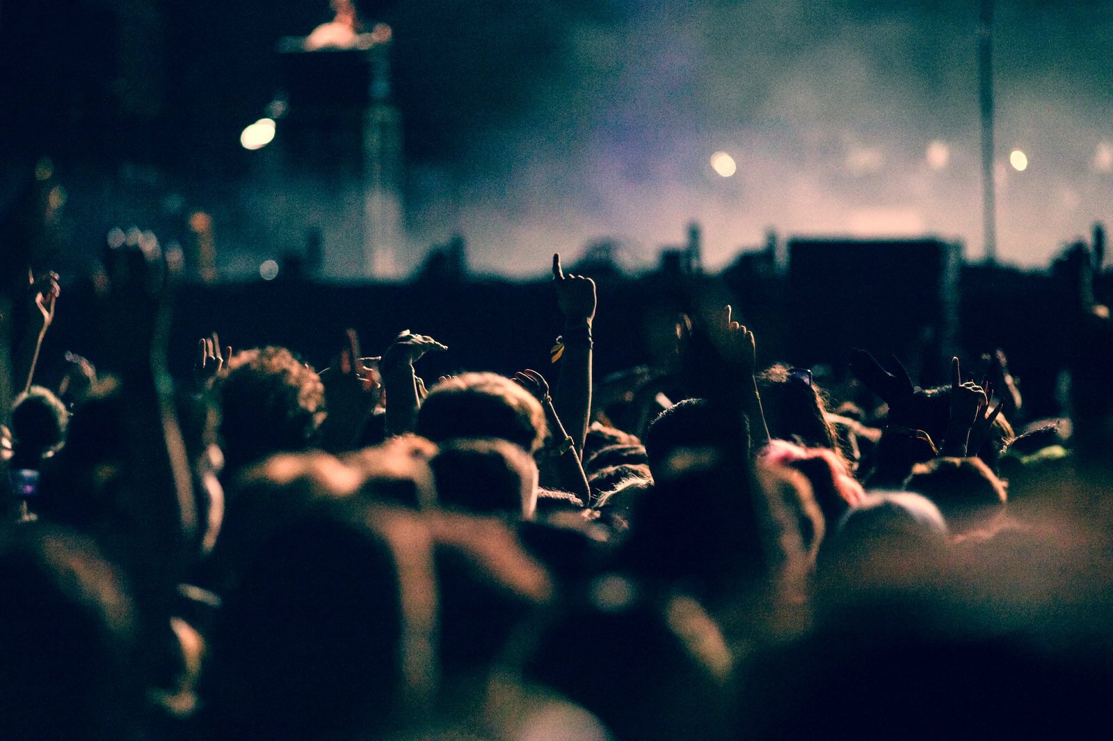 crowd partying stage lights live concert summer music festival
